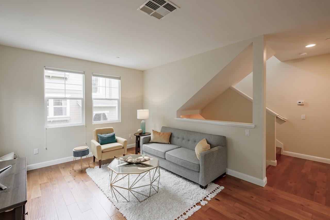237 Bluebonnet Lane, Unit 304 Scotts Valley, CA 95066 - Photo 11 of 79 a living room with furniture and a window