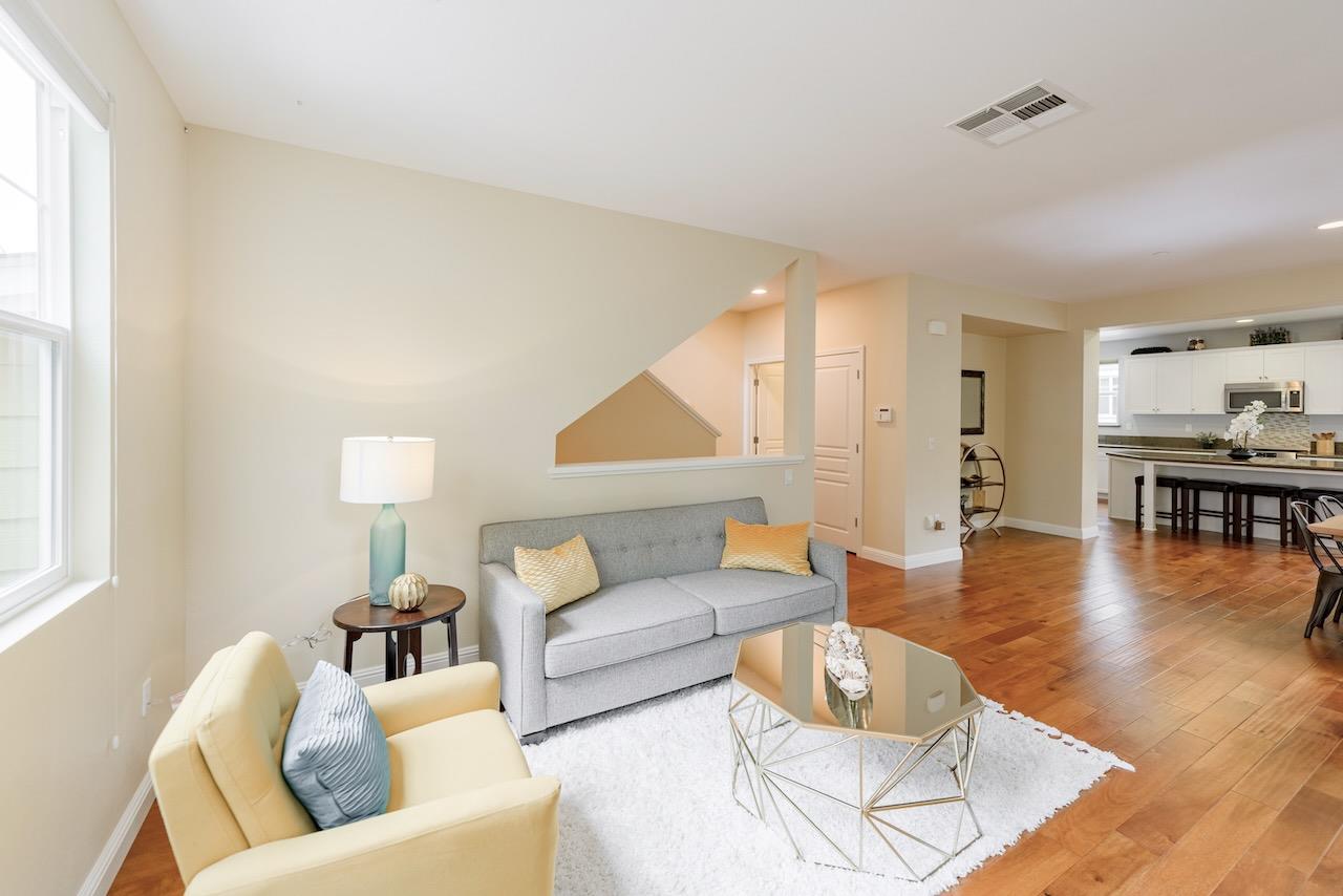 237 Bluebonnet Lane, Unit 304 Scotts Valley, CA 95066 - Photo 12 of 79 a living room with furniture and a wooden floor
