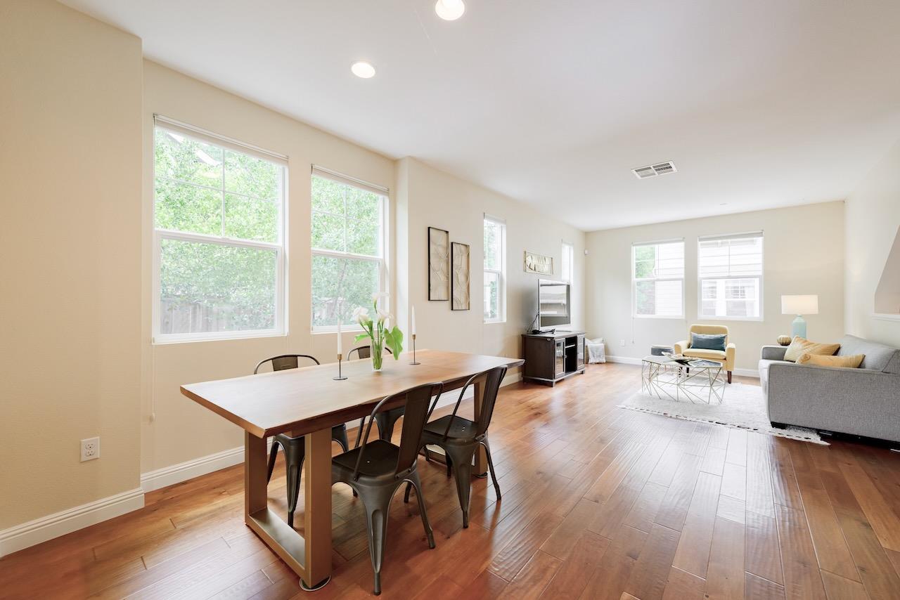 237 Bluebonnet Lane, Unit 304 Scotts Valley, CA 95066 - Photo 14 of 79 a view of a dining room with furniture window and wooden floor
