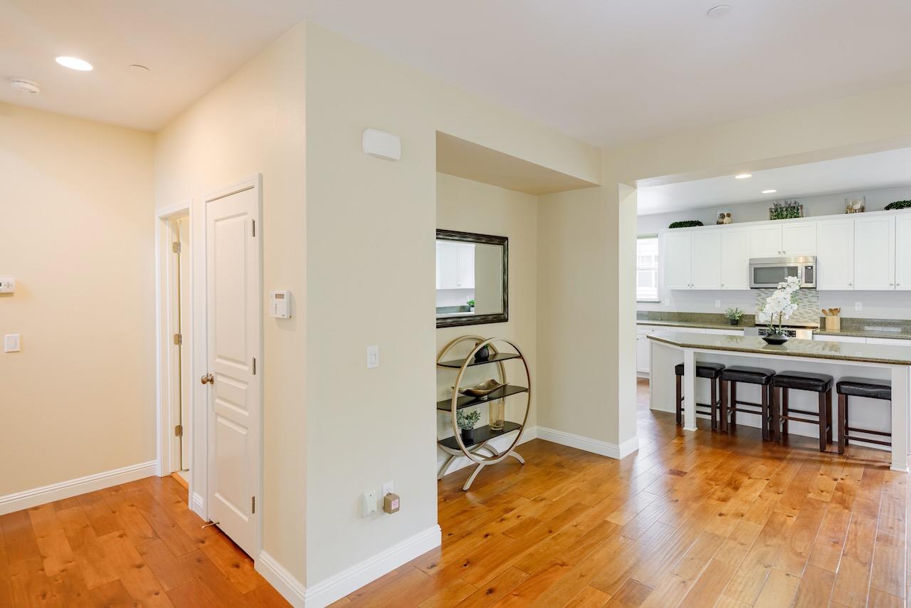 237 Bluebonnet Lane, Unit 304 Scotts Valley, CA 95066 - Photo 15 of 79 a kitchen with stainless steel appliances granite countertop a refrigerator and a stove top oven