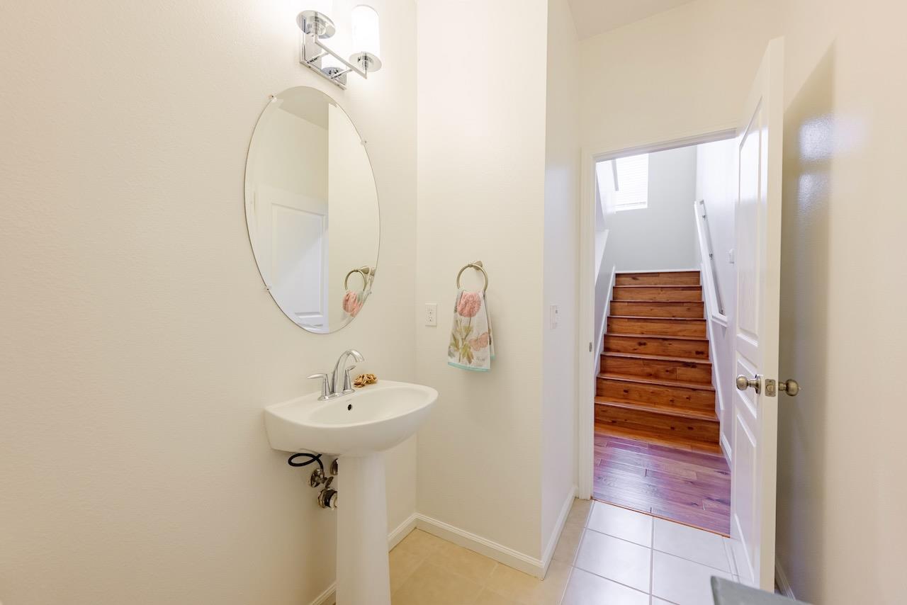 237 Bluebonnet Lane, Unit 304 Scotts Valley, CA 95066 - Photo 25 of 79 a bathroom with a sink and a mirror