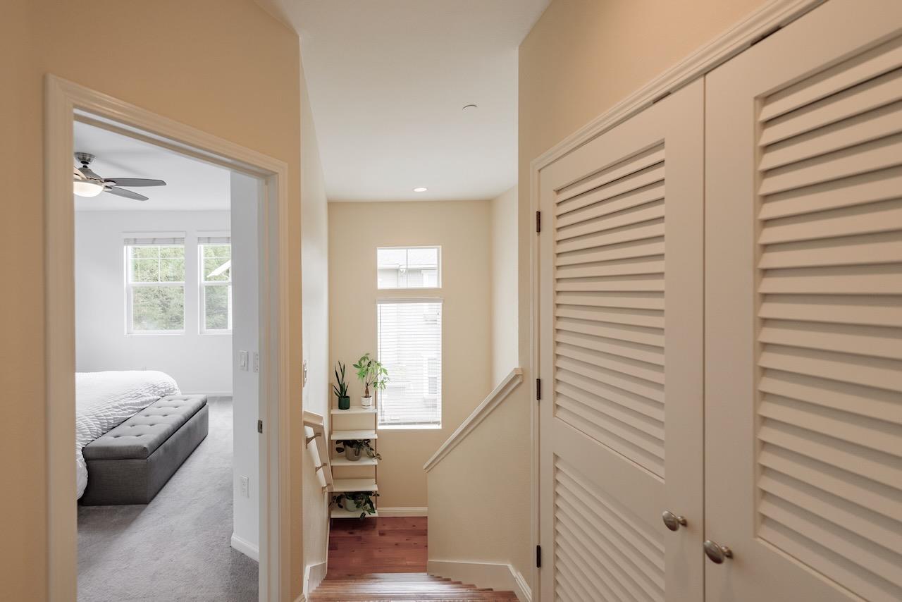 237 Bluebonnet Lane, Unit 304 Scotts Valley, CA 95066 - Photo 29 of 79 a view of a bedroom with a bed and wooden floor
