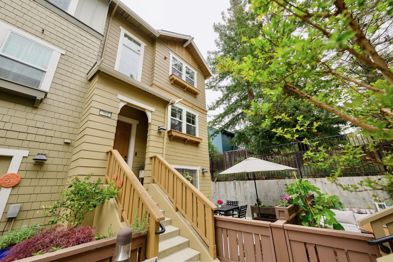 237 Bluebonnet Lane, Unit 304 Scotts Valley, CA 95066 - Photo 4 of 79 a view of a house with wooden stairs and a table and chairs