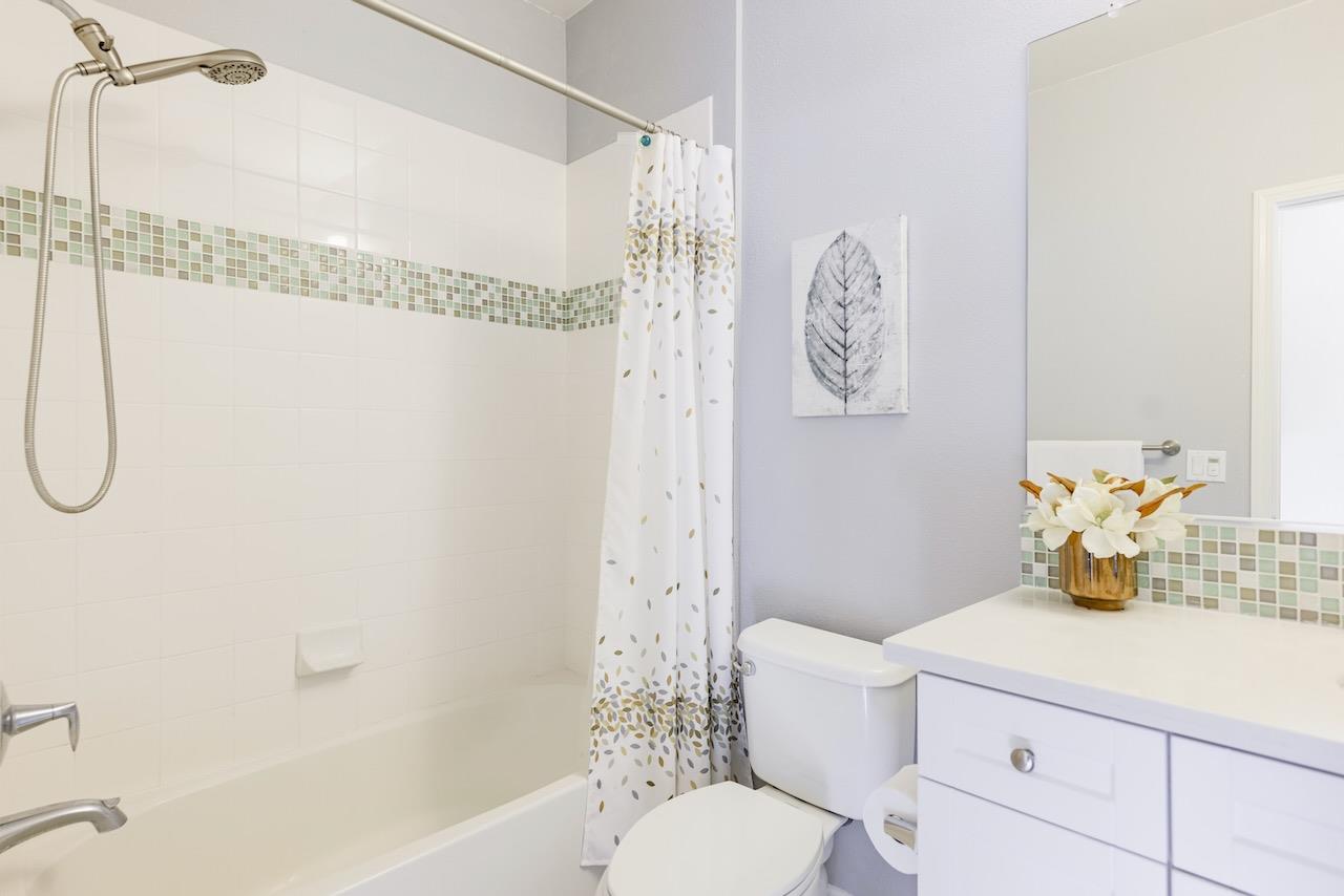 237 Bluebonnet Lane, Unit 304 Scotts Valley, CA 95066 - Photo 50 of 79 a bathroom with a sink toilet and shower