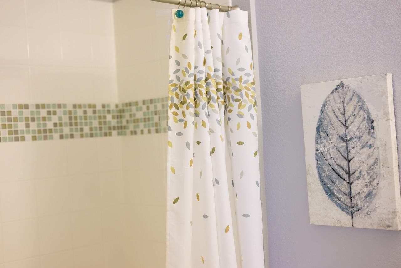 237 Bluebonnet Lane, Unit 304 Scotts Valley, CA 95066 - Photo 53 of 79 a bathroom with a shower curtain and a large window