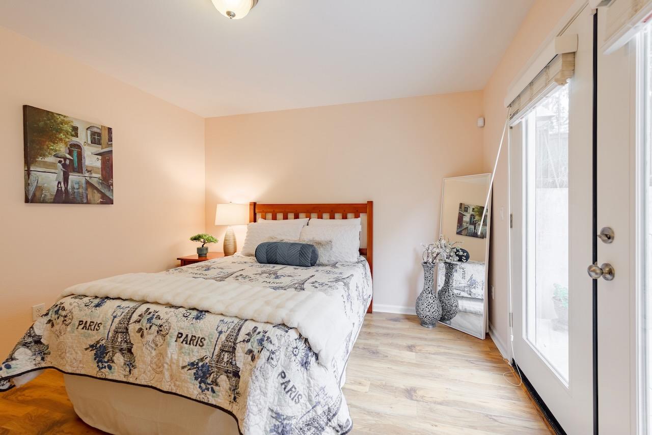 237 Bluebonnet Lane, Unit 304 Scotts Valley, CA 95066 - Photo 61 of 79 a bedroom with a bed and a window