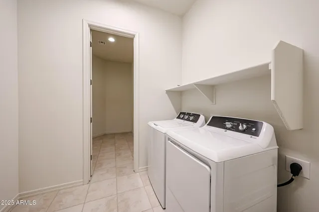 a house with a big yard and large trees