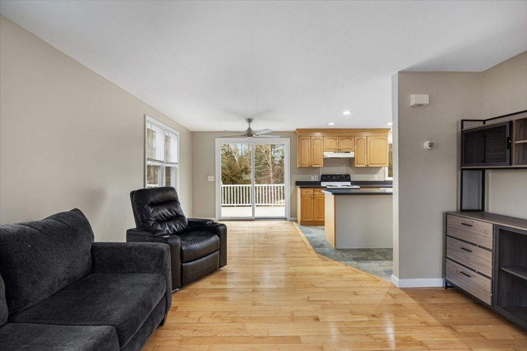 18 Heather Hill Road Bourne, MA 02532 - Photo 11 of 28 a living room with furniture and a flat screen tv