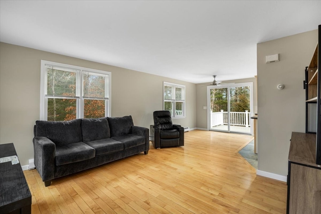 18 Heather Hill Road Bourne, MA 02532 - Photo 12 of 28 a living room with furniture and a window