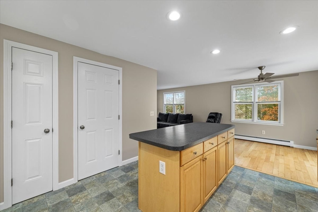 18 Heather Hill Road Bourne, MA 02532 - Photo 14 of 28 a kitchen with sink refrigerator and window