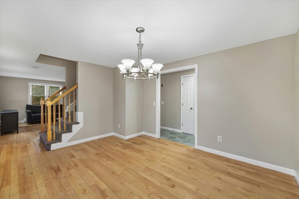 18 Heather Hill Road Bourne, MA 02532 - Photo 18 of 28 a view of a chandelier in a room