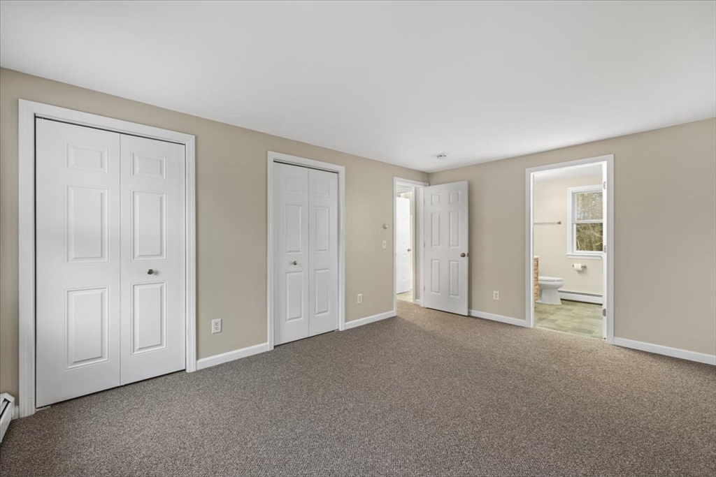 18 Heather Hill Road Bourne, MA 02532 - Photo 23 of 28 a view of an empty room and closet area