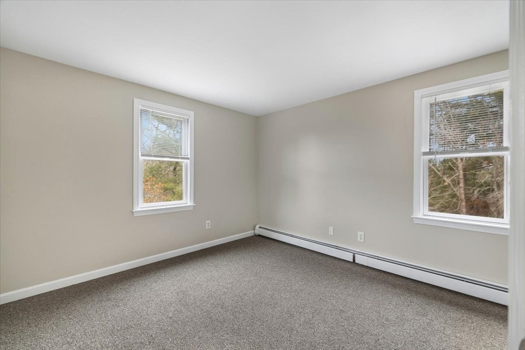 18 Heather Hill Road Bourne, MA 02532 - Photo 25 of 28 an empty room with a window