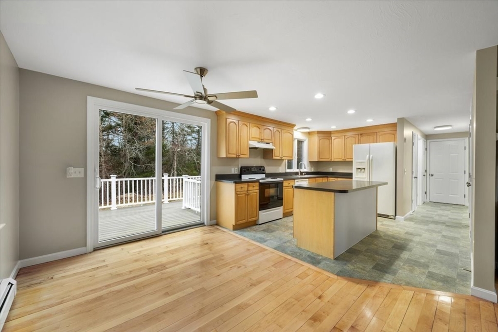 18 Heather Hill Road Bourne, MA 02532 - Photo 8 of 28 a view of kitchen with wooden floor