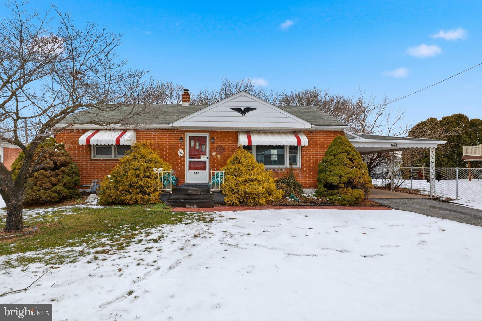 Charming brick home with winter charm.