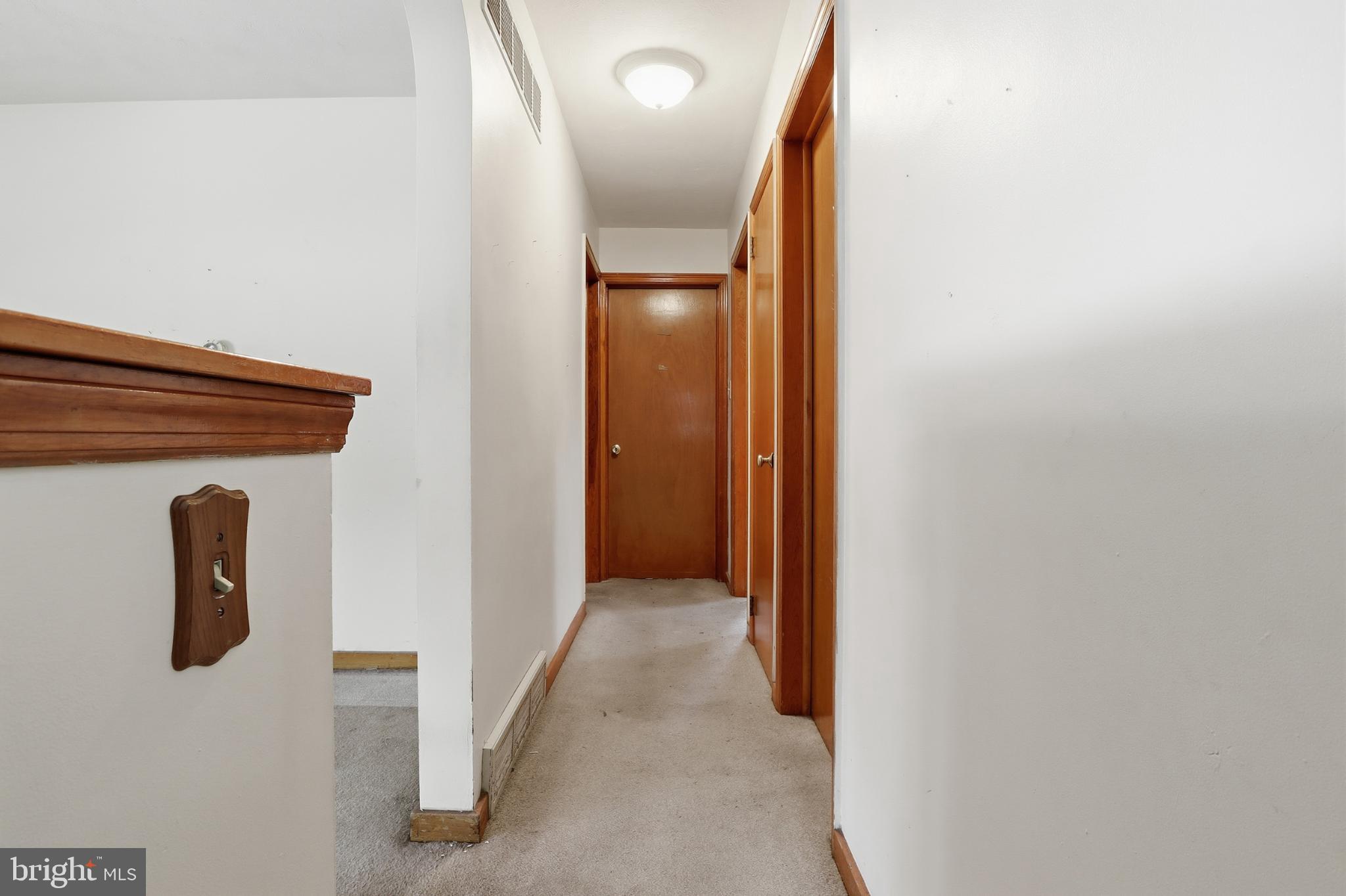 865 Taxville Road York, PA 17404 - Photo 15 of 40 Inviting hallway with warm wooden accents.