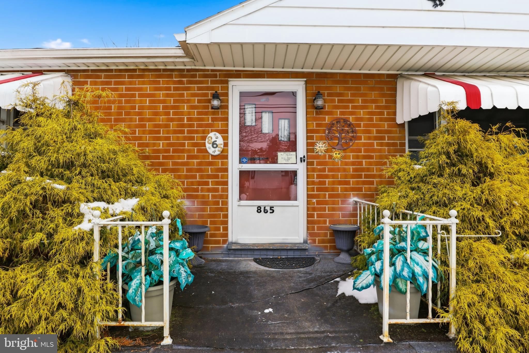 865 Taxville Road York, PA 17404 - Photo 6 of 40 Charming entrance with vibrant greenery.