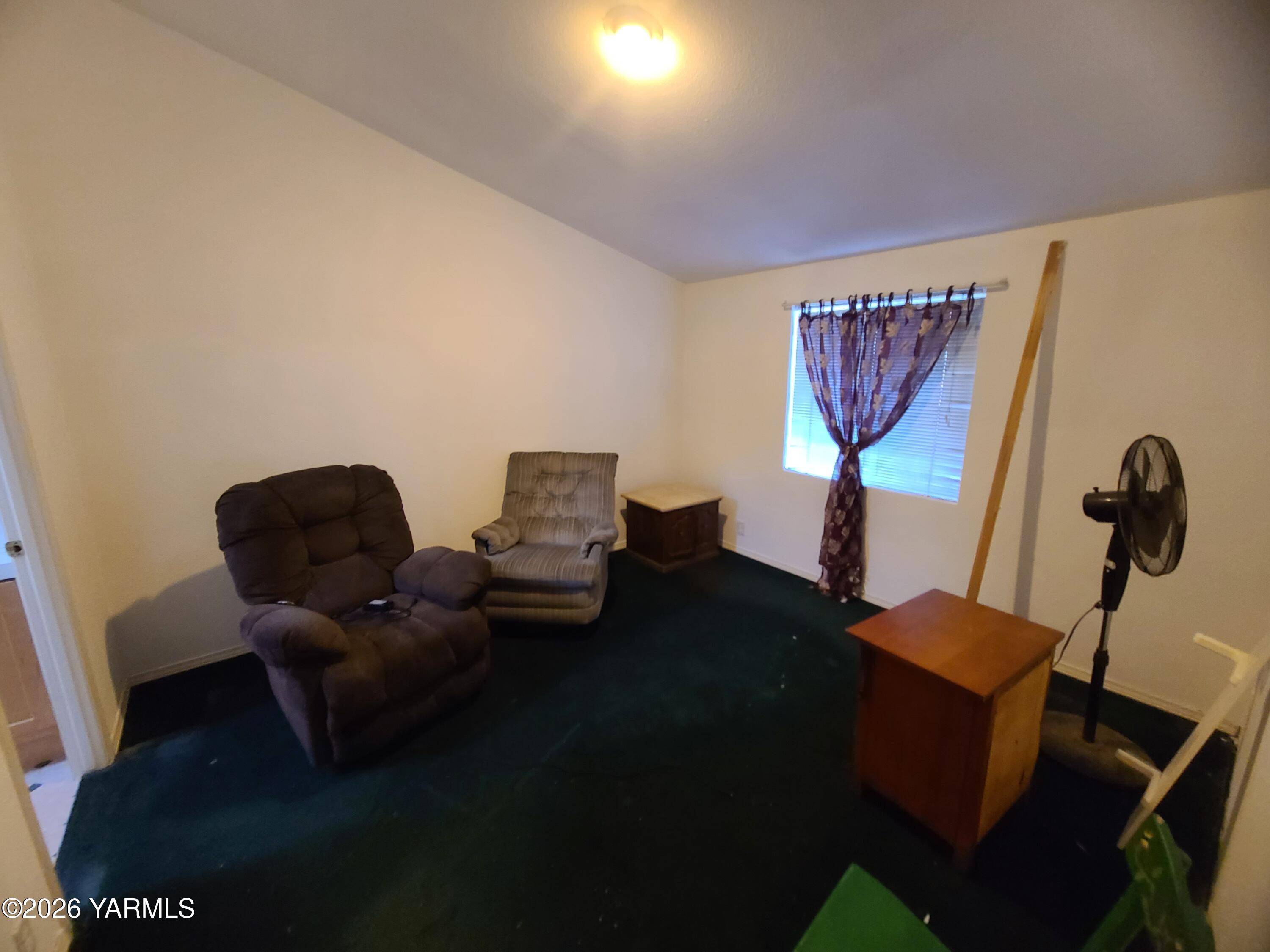 10608 Hackett Road Yakima, WA 98903 - Photo 24 of 25 a living room with furniture and a window