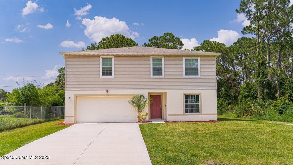 141 Tucson Road Southwest Palm Bay, FL 32908 - Photo 1 of 20 Front of Home