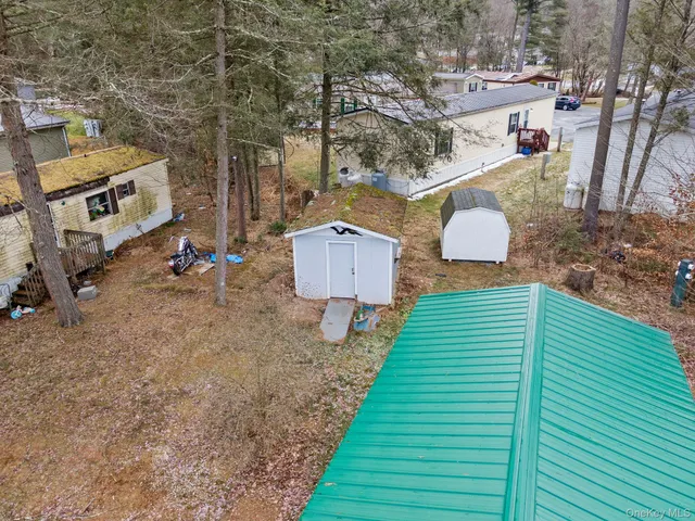 swimming pool view with a outdoor seating