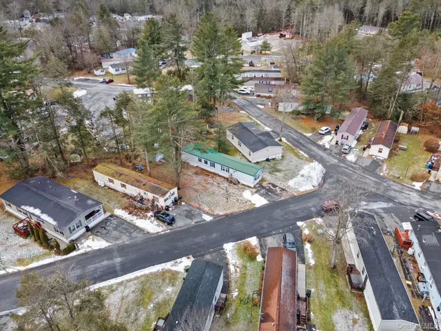 an aerial view of a city with lots of residential buildings