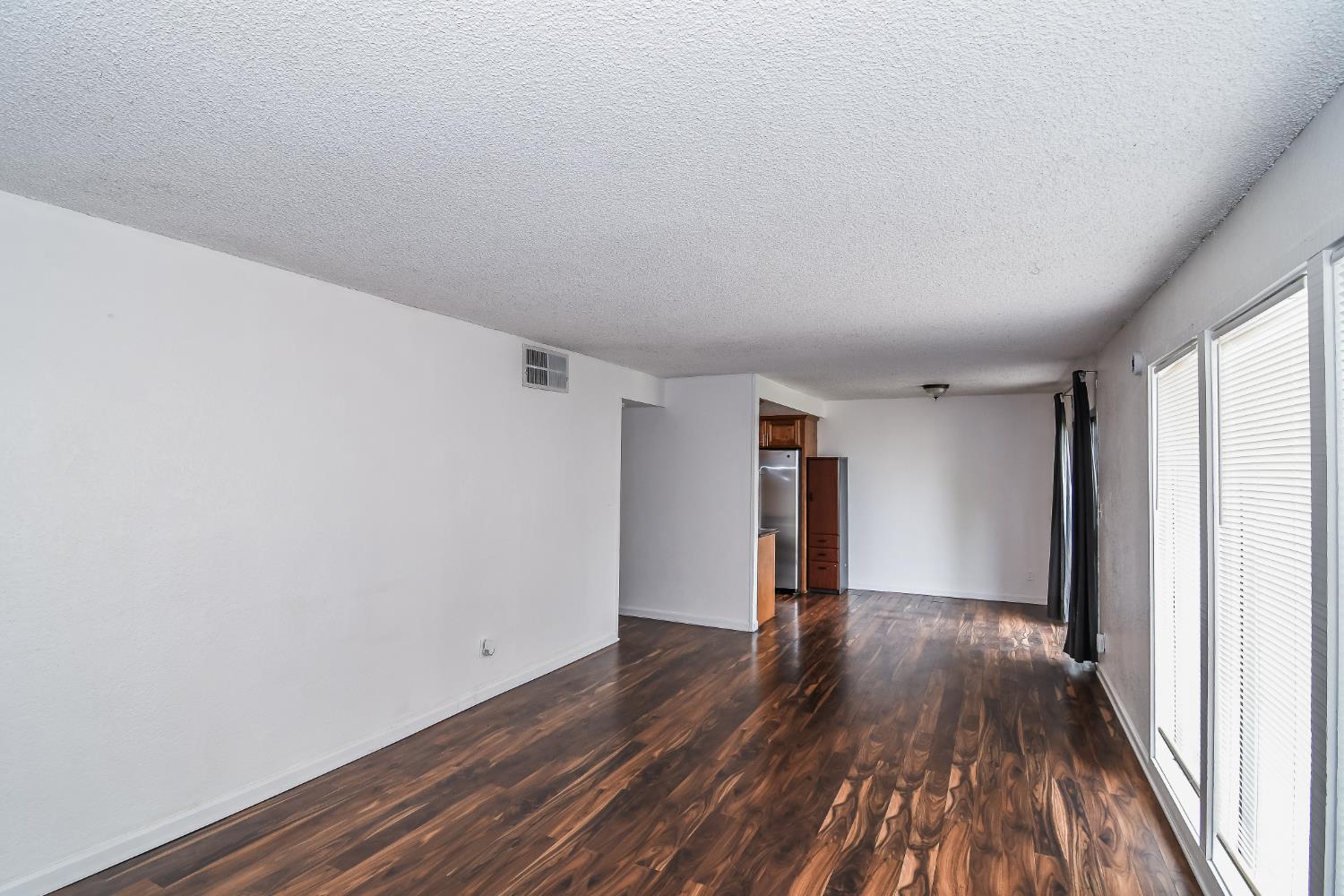 1139 Rivara Circle Sacramento, CA 95864 - Photo 9 of 72 a view of empty room with wooden floor
