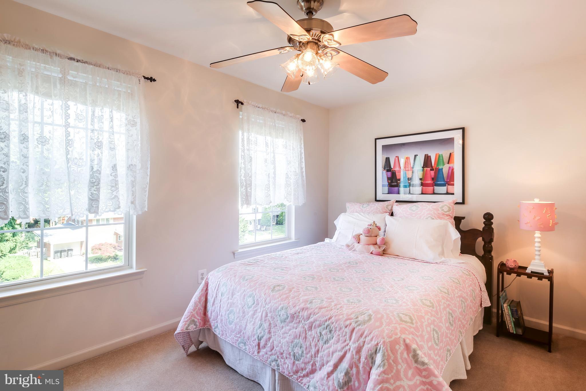 3614 Valley Road Ellicott City, MD 21042 - Photo 19 of 27 a bedroom with a large bed and a window