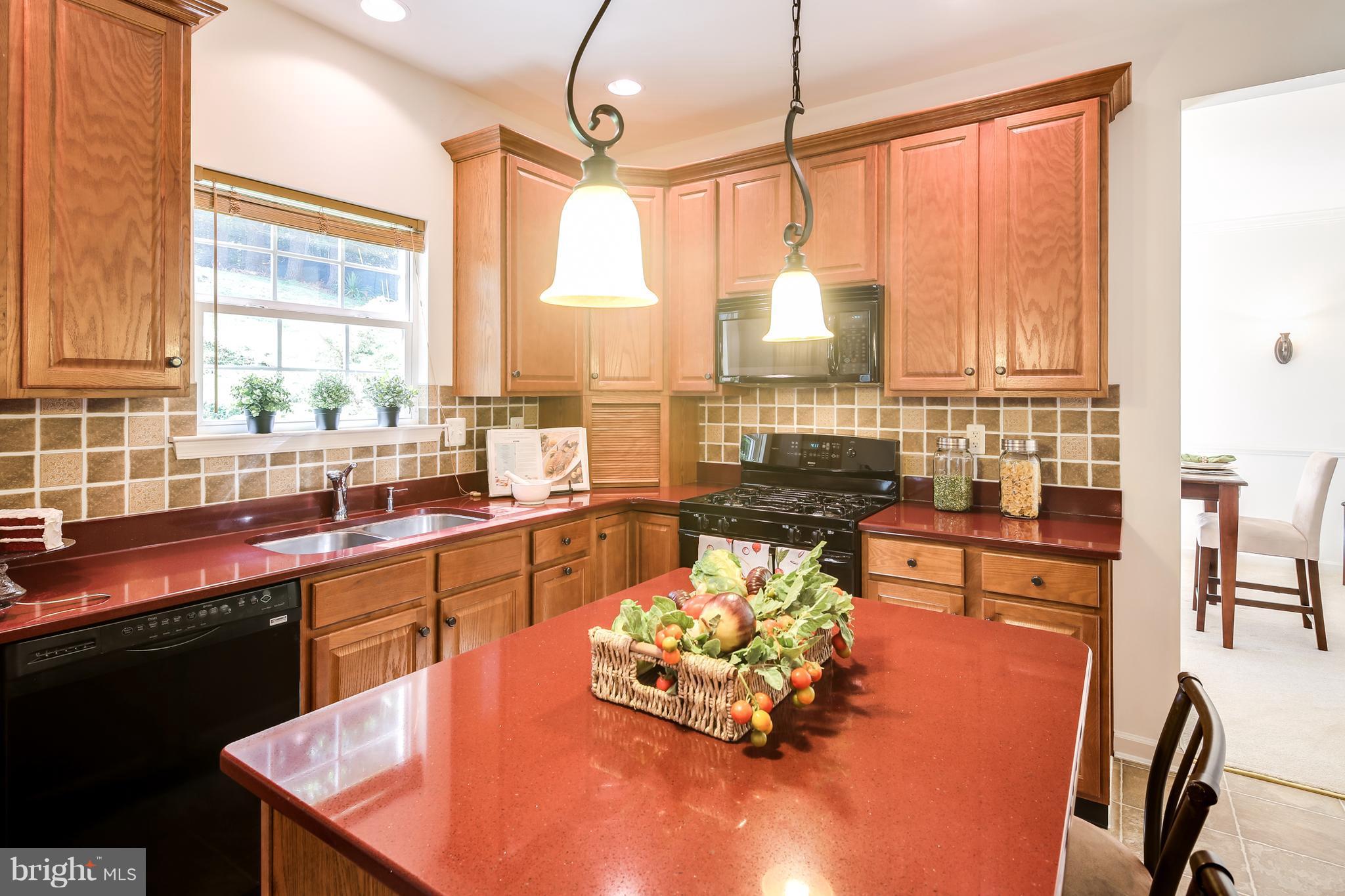 3614 Valley Road Ellicott City, MD 21042 - Photo 7 of 27 a kitchen with a large window and cabinets