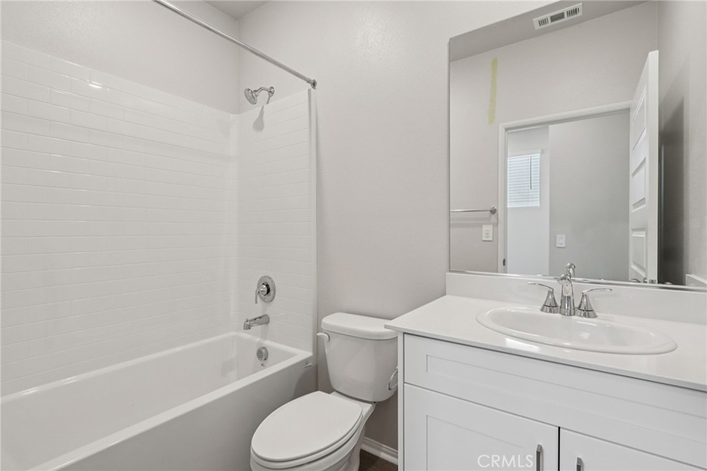 2070 Meyer Lane Redlands, CA 92374 - Photo 18 of 44 a bathroom with a sink a toilet and a bathtub