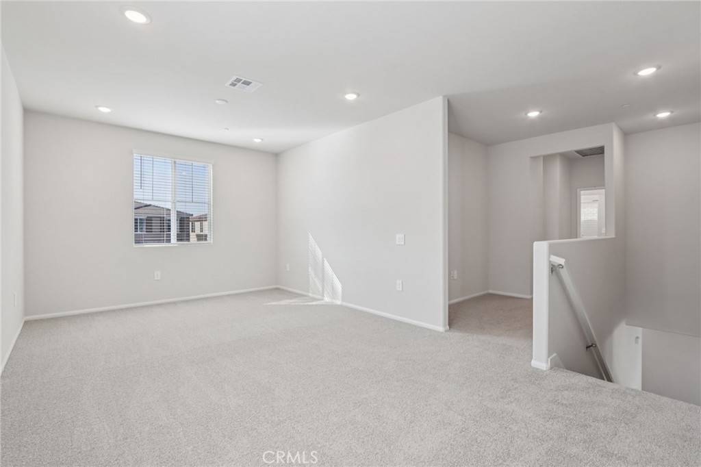 2070 Meyer Lane Redlands, CA 92374 - Photo 21 of 44 a view of an empty room with a window and a living room