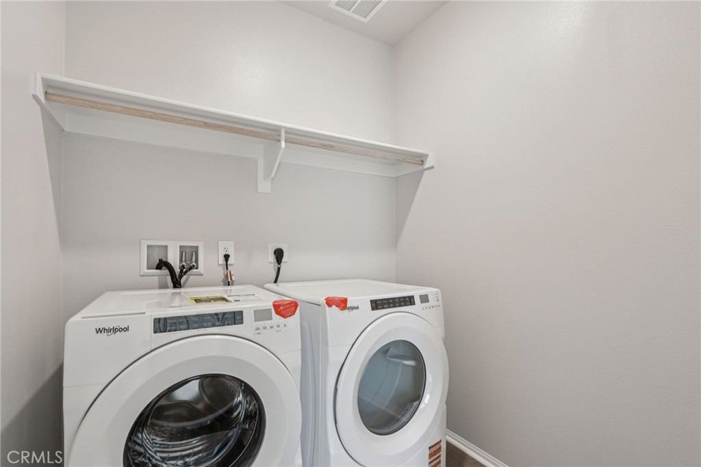 2070 Meyer Lane Redlands, CA 92374 - Photo 24 of 44 a utility room with dryer and washer