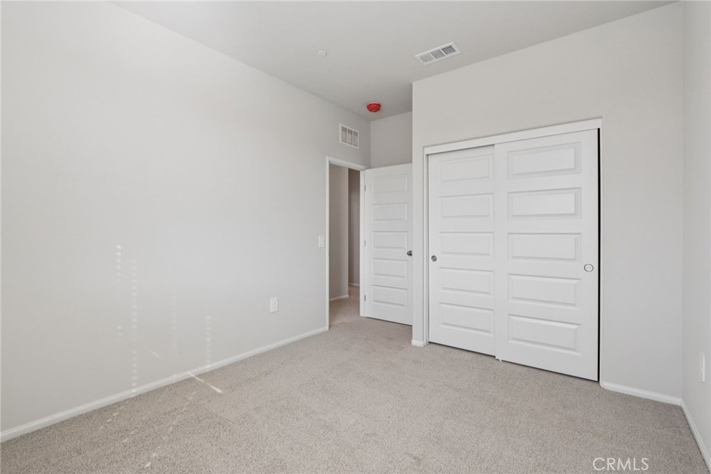2070 Meyer Lane Redlands, CA 92374 - Photo 30 of 44 an empty room with closet