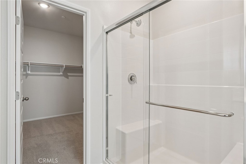 2070 Meyer Lane Redlands, CA 92374 - Photo 39 of 44 a bathroom with a glass shower door
