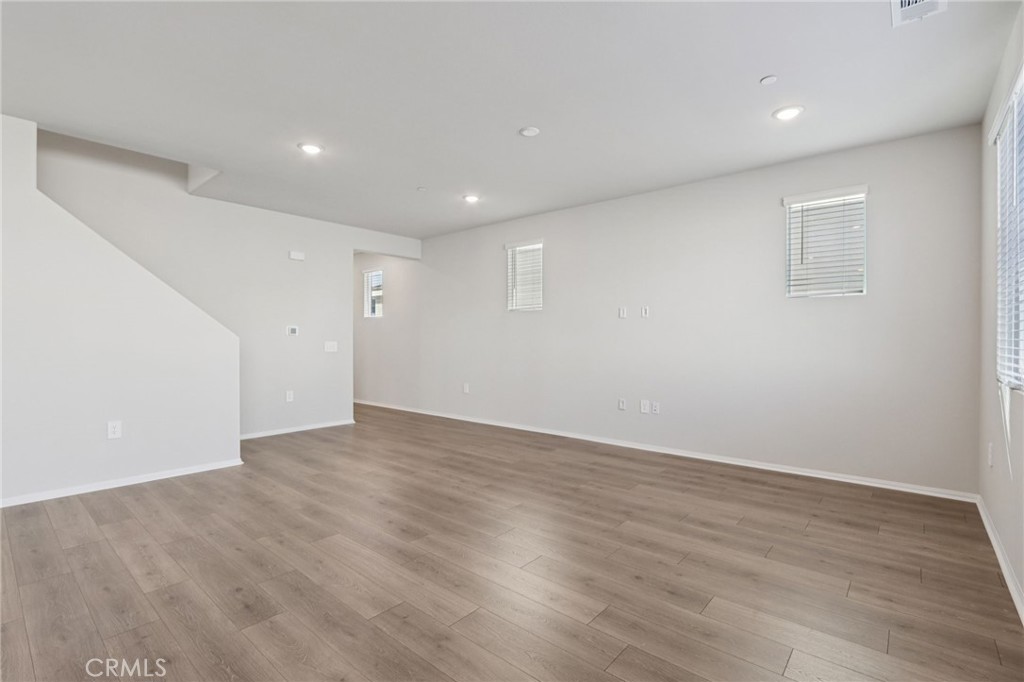 2070 Meyer Lane Redlands, CA 92374 - Photo 4 of 44 a view of an empty room with wooden floor