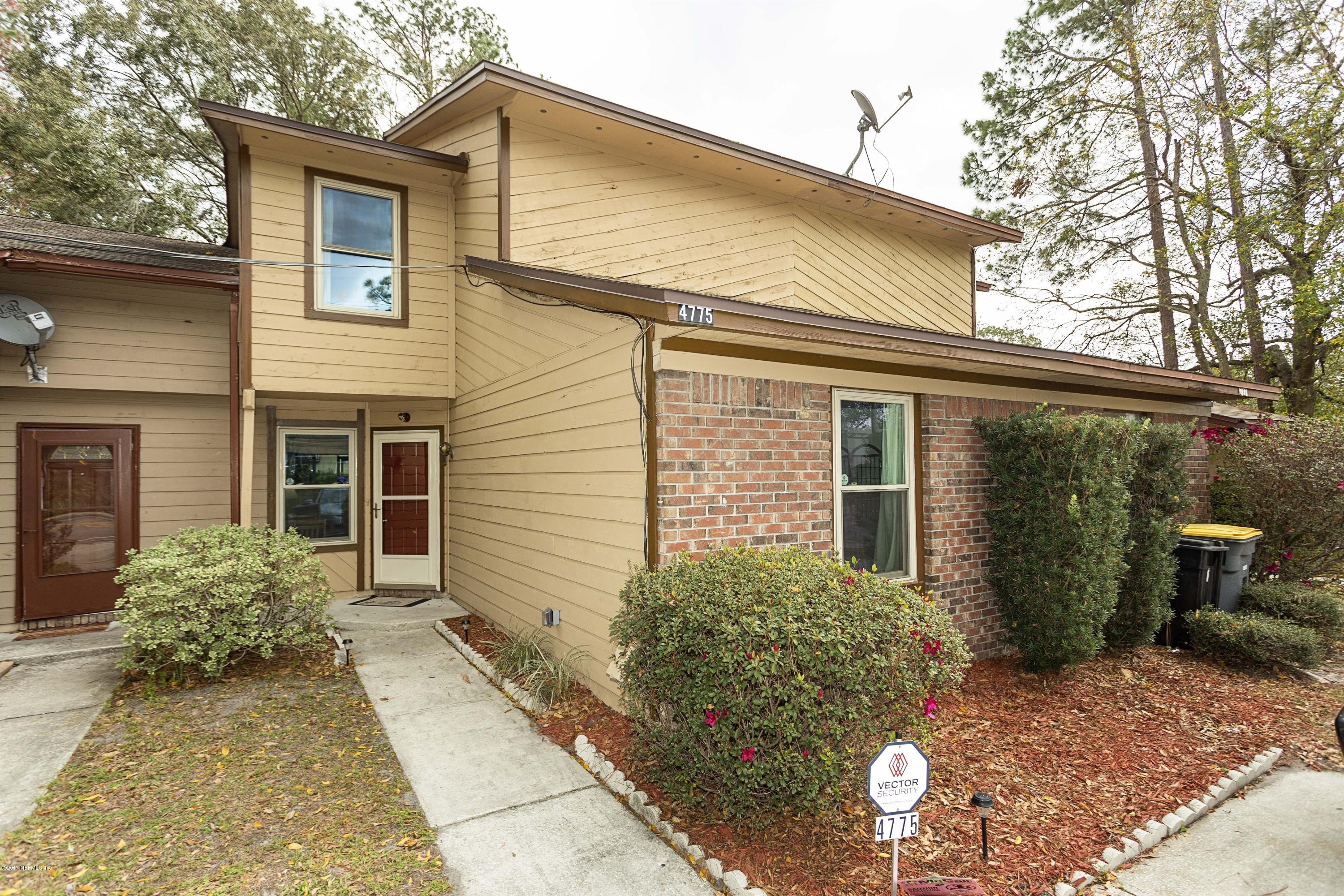 4775 Barnes Road South Jacksonville, FL 32207 - Photo 1 of 19 a view of a house with a yard