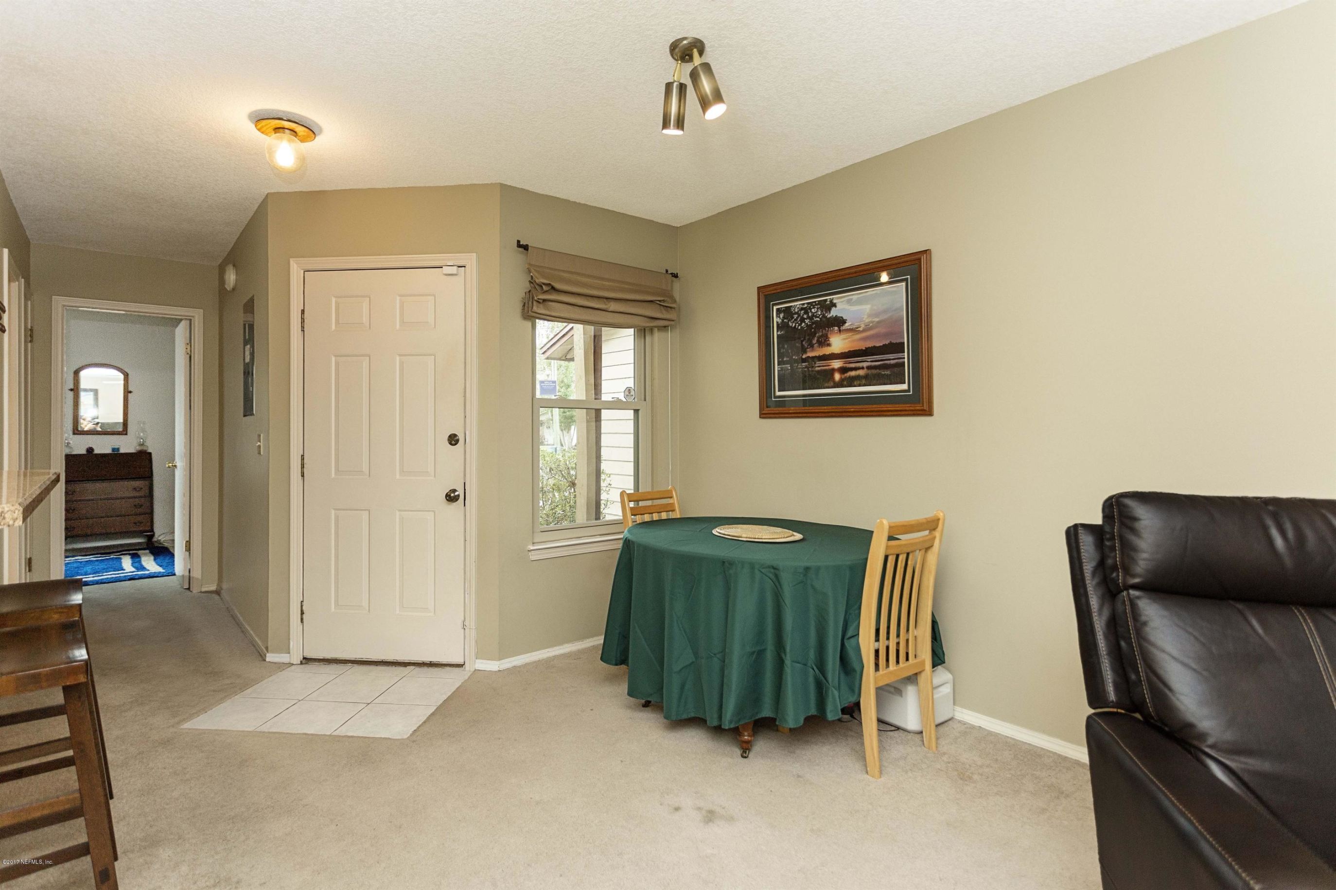4775 Barnes Road South Jacksonville, FL 32207 - Photo 6 of 19 a living room with furniture and a window