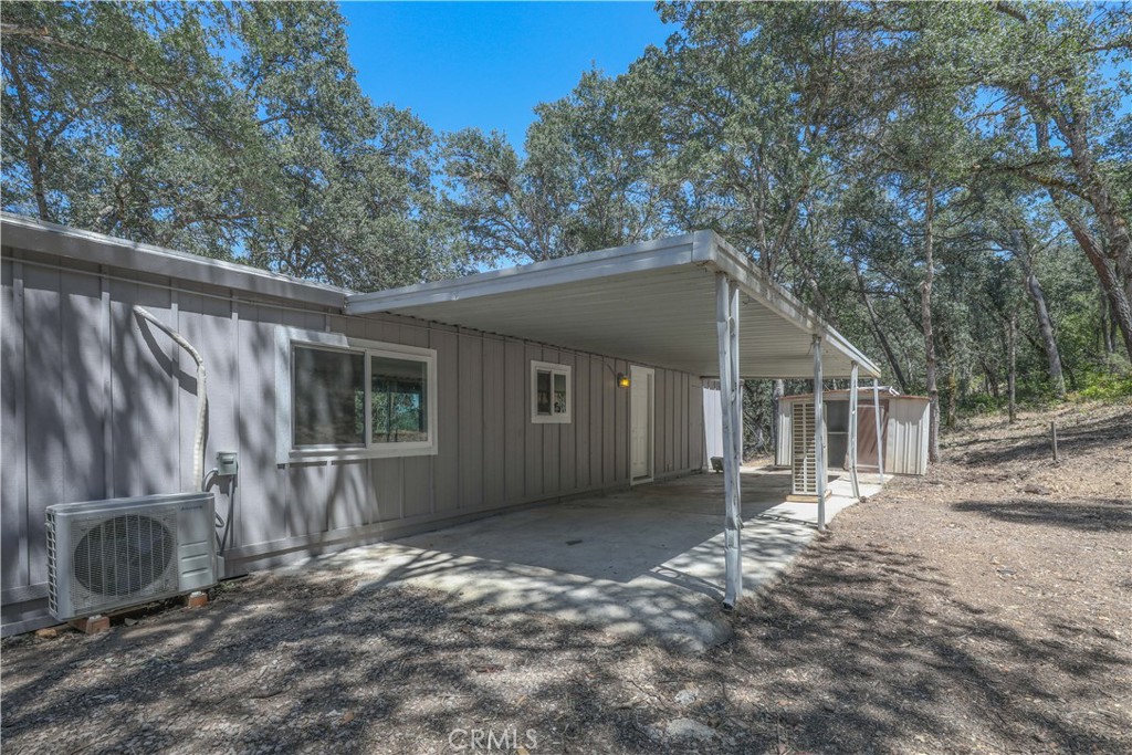 15905 Kugelman Street Lower Lake, CA 95457 - Photo 21 of 75 a front view of a house with a yard