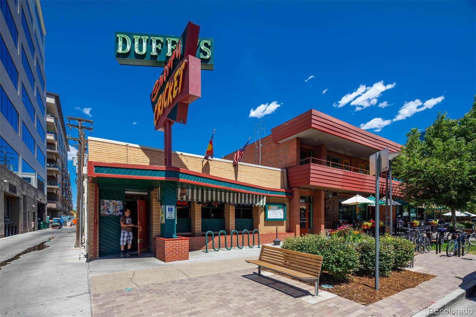167 Monroe Street Denver, CO 80206 - Photo 37 of 39 a view of a house with a street