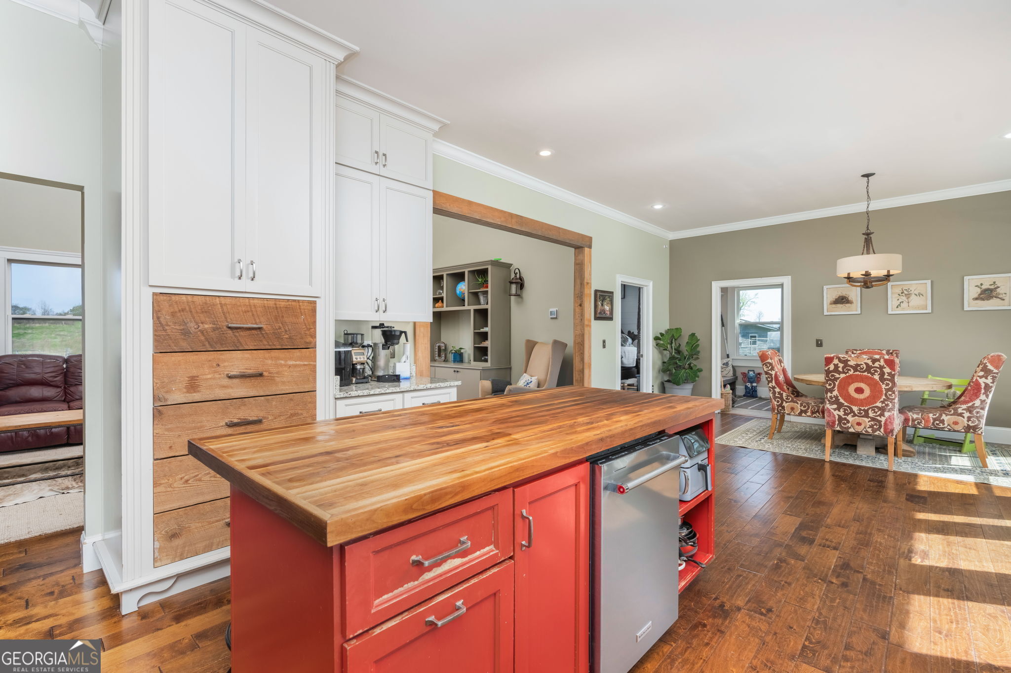 1725 Watermelon Road Tennille, GA 31089 - Photo 11 of 55 a dining hall with stainless steel appliances granite countertop a stove and a kitchen island