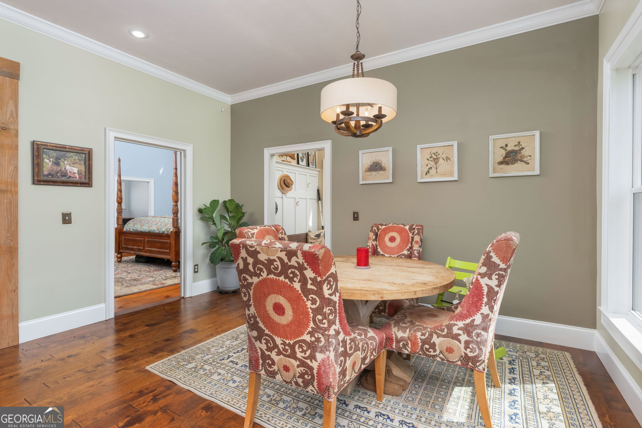 1725 Watermelon Road Tennille, GA 31089 - Photo 14 of 55 a view of a dining room and hall with wooden floor