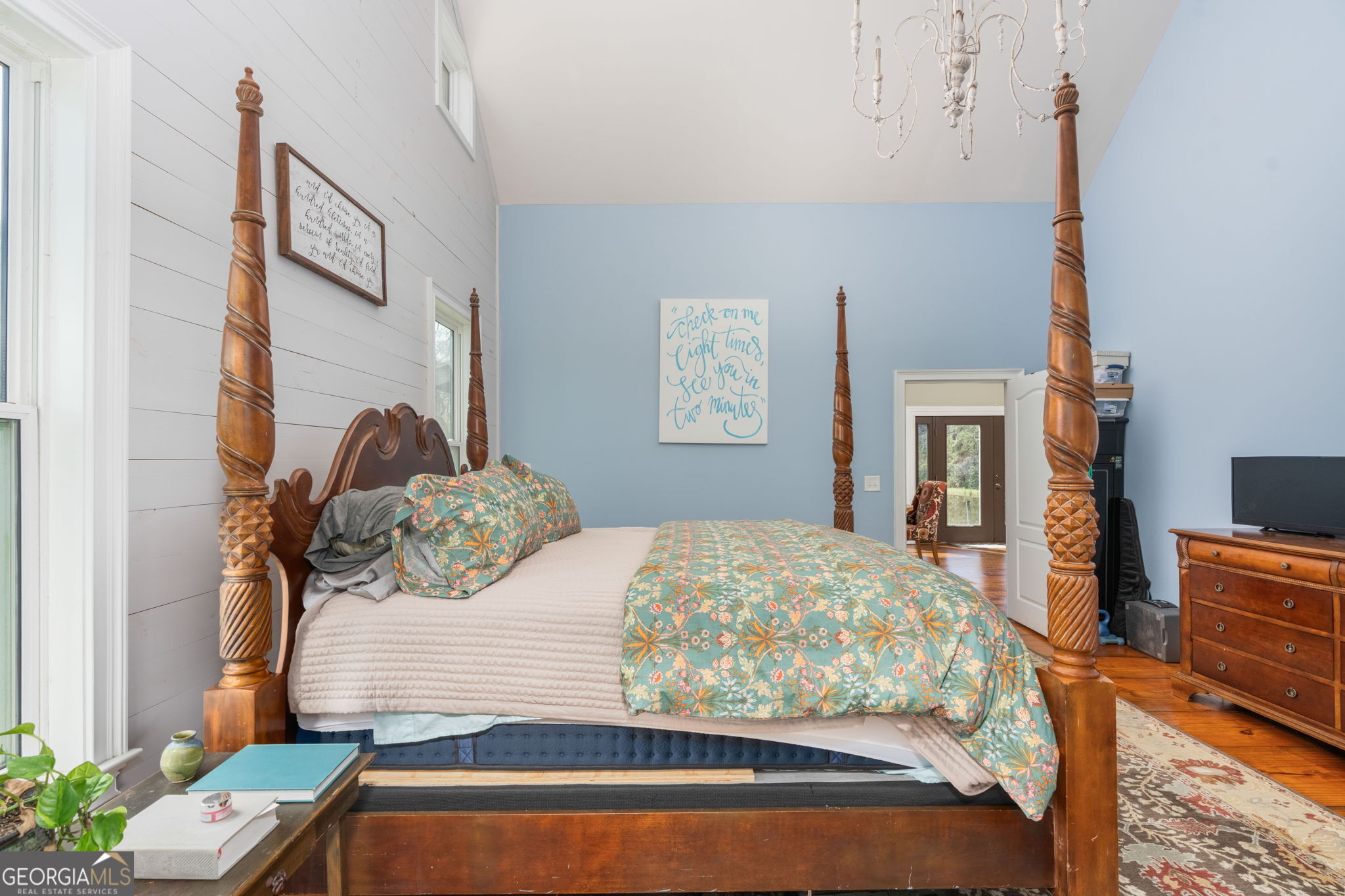 1725 Watermelon Road Tennille, GA 31089 - Photo 16 of 55 a bedroom with a bed and a flat screen tv