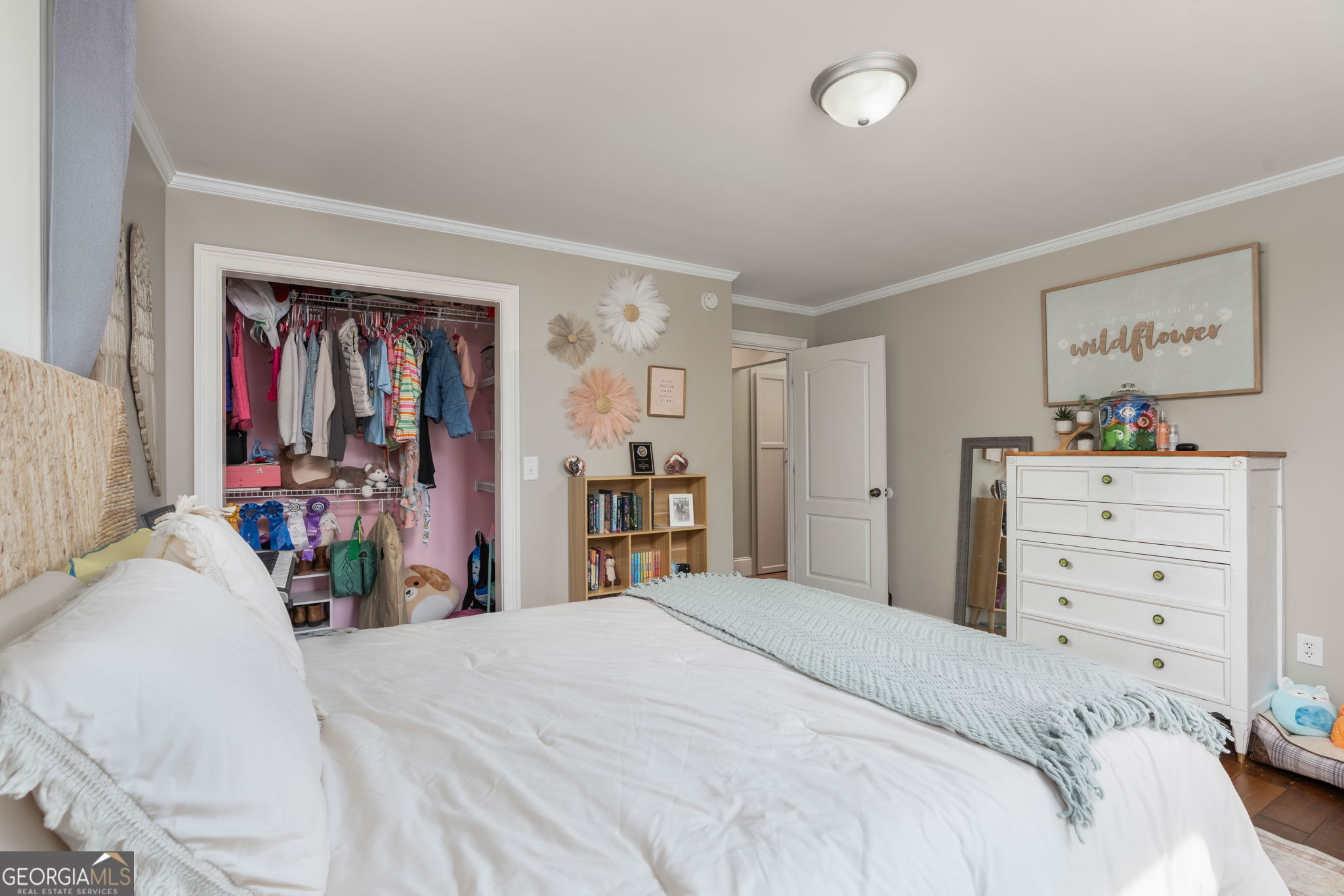 1725 Watermelon Road Tennille, GA 31089 - Photo 21 of 55 a bedroom with a bed and a closet