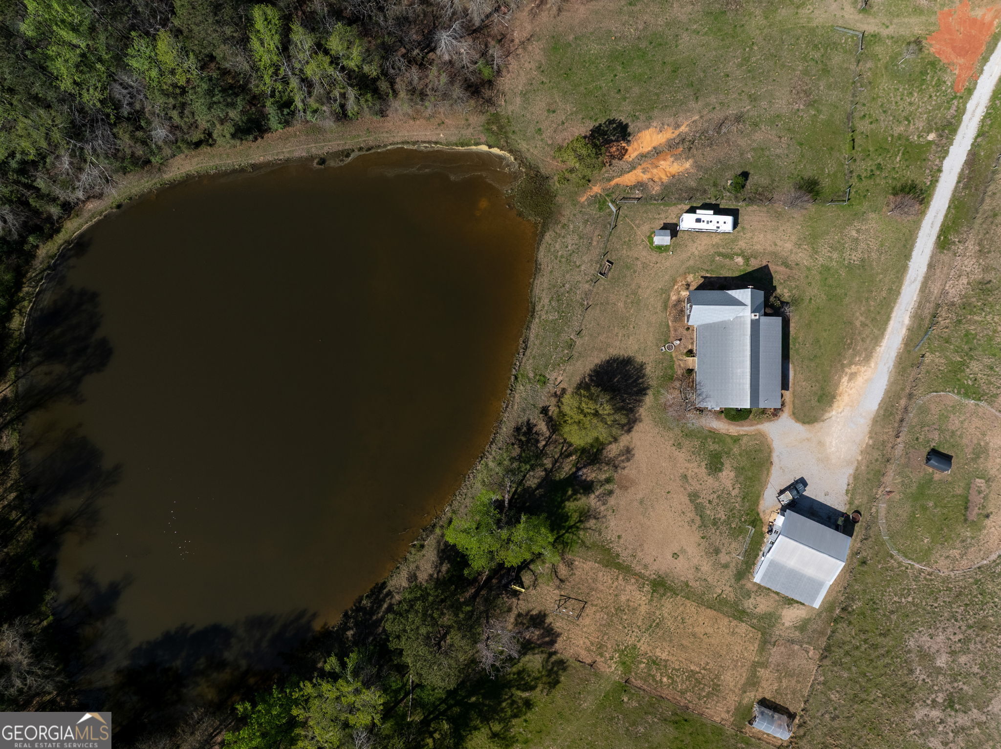 1725 Watermelon Road Tennille, GA 31089 - Photo 41 of 55 an aerial view of houses with outdoor space