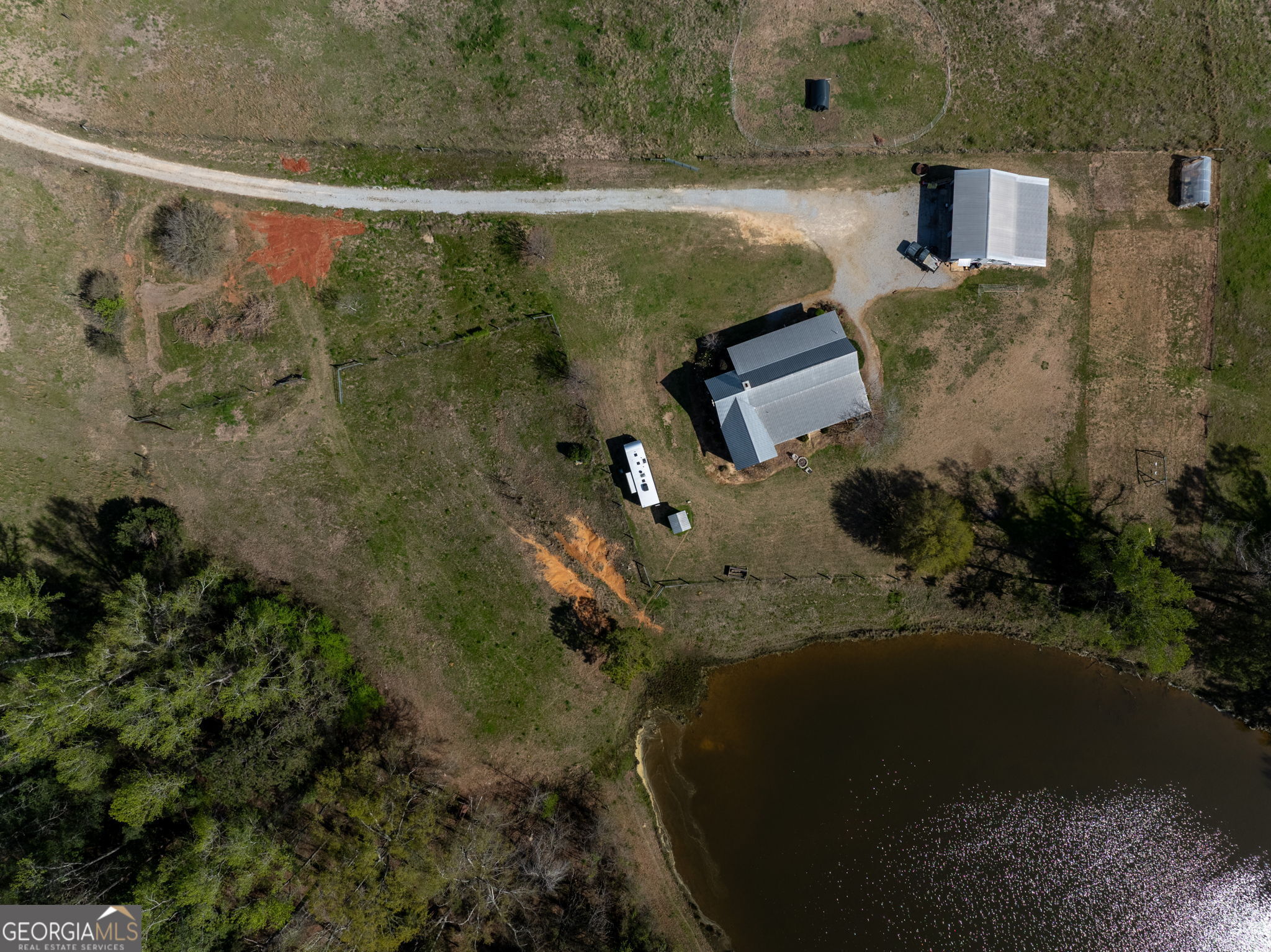 1725 Watermelon Road Tennille, GA 31089 - Photo 42 of 55 an aerial view of a house with a yard