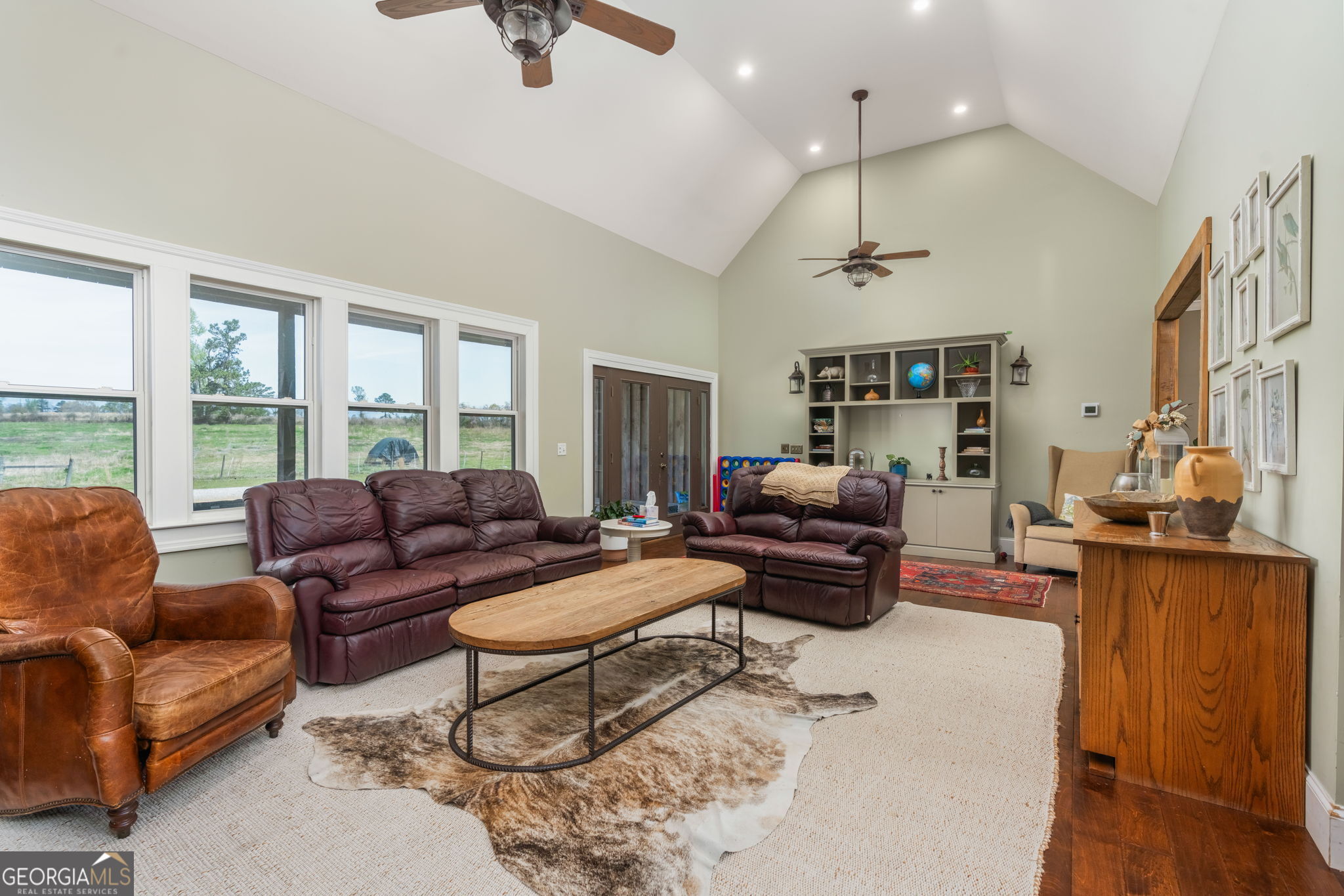 1725 Watermelon Road Tennille, GA 31089 - Photo 6 of 55 a living room with furniture and a large window