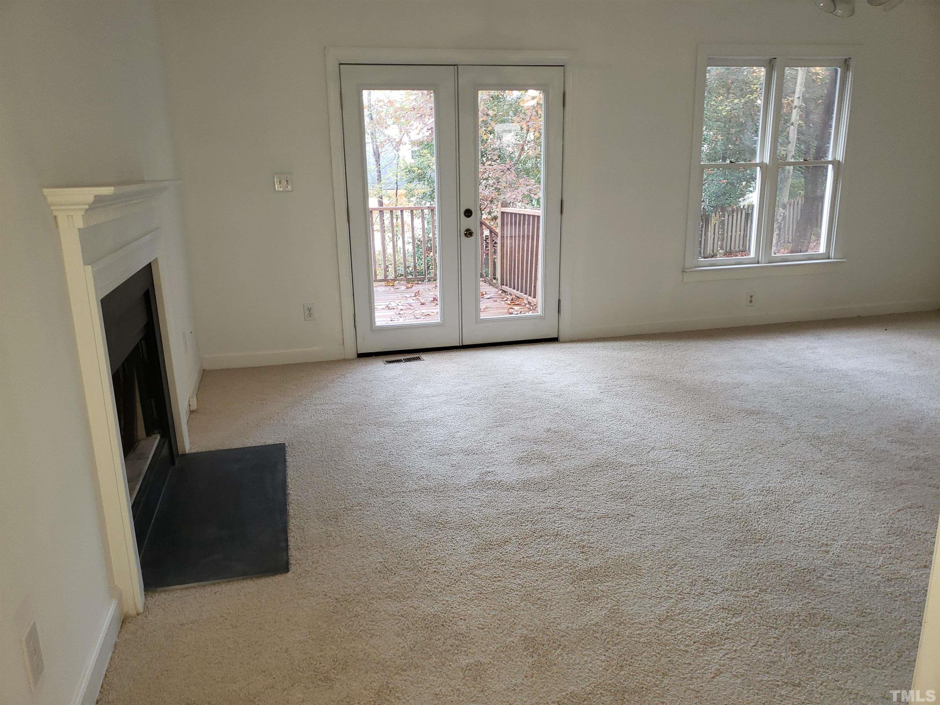 6009 Tarleton Court Raleigh, NC 27616 - Photo 22 of 24 an empty room with windows and closet