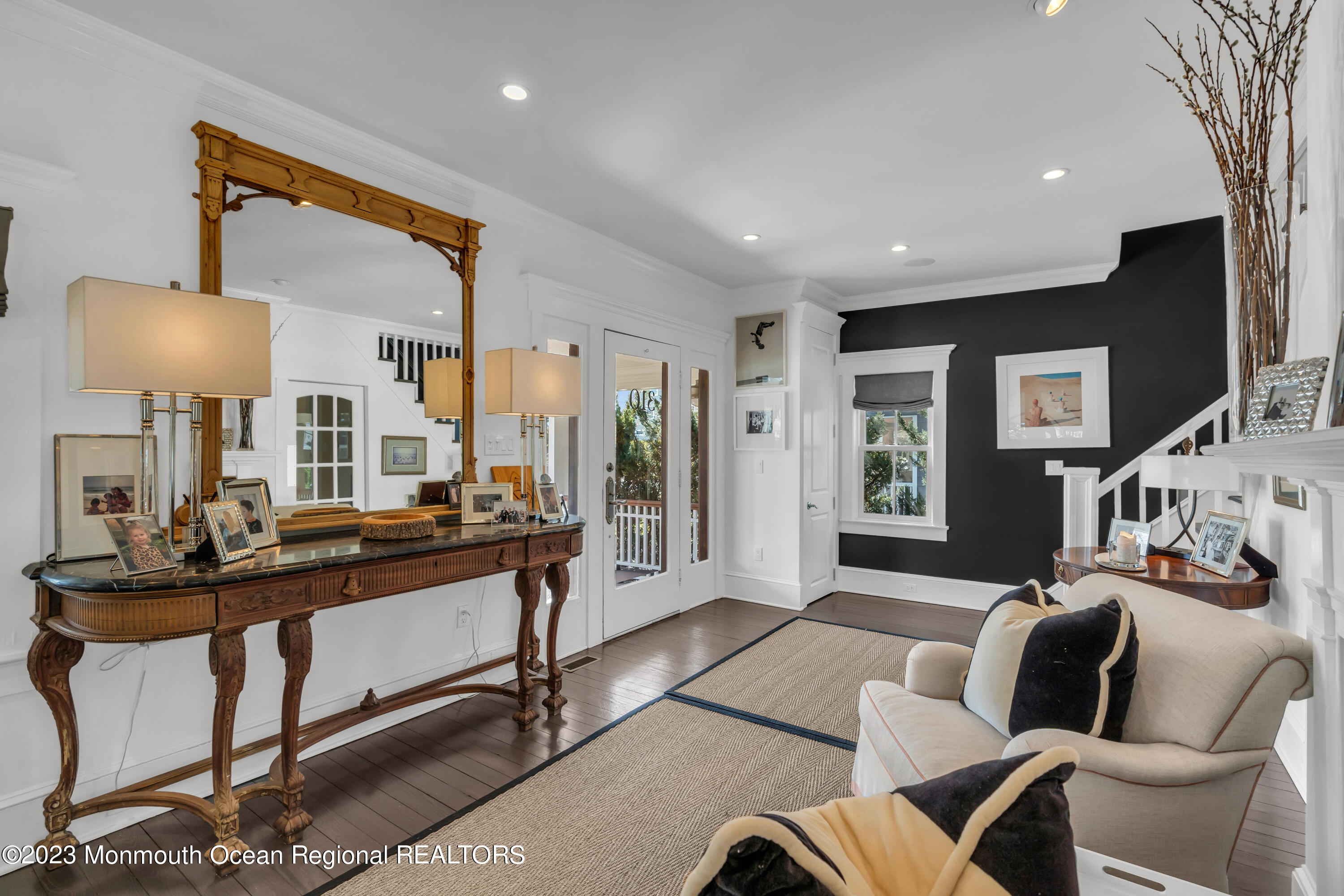 310 Worthington Avenue Spring Lake, NJ 07762 - Photo 13 of 53 a living room with furniture and a lamp