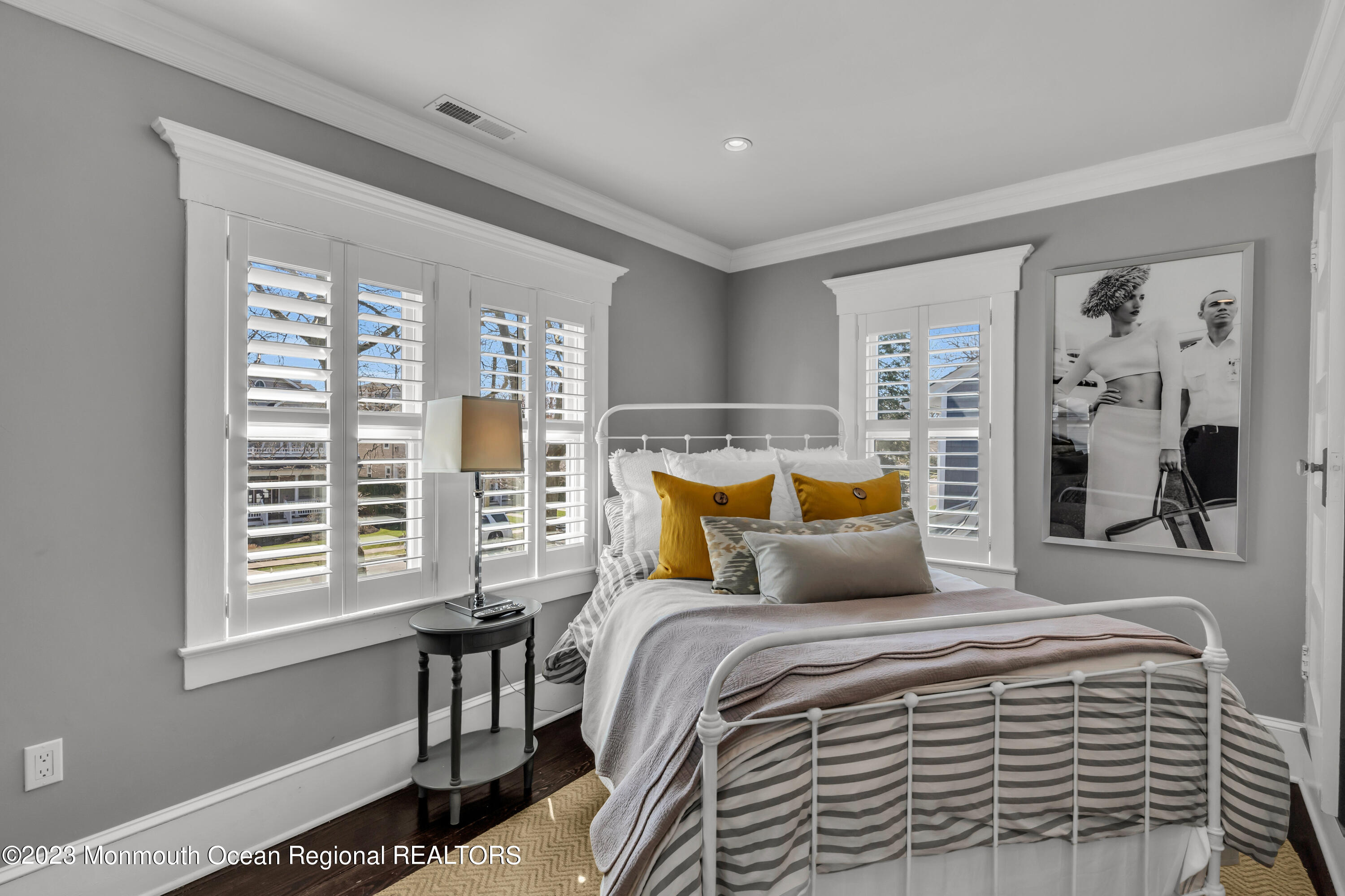 310 Worthington Avenue Spring Lake, NJ 07762 - Photo 25 of 53 a bedroom with a large bed and a window