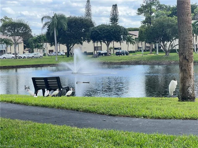 a view of a lake with a house