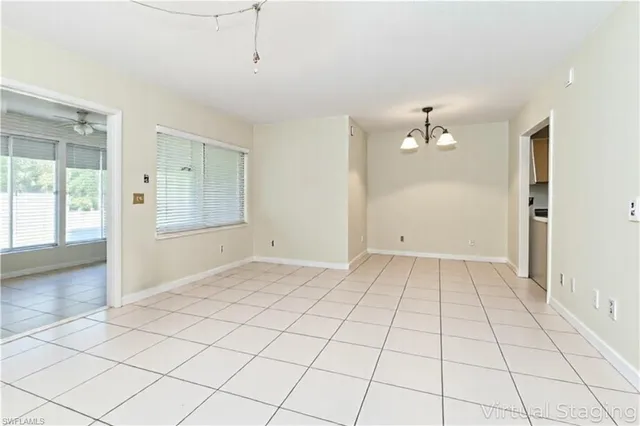 a view of an empty room and window